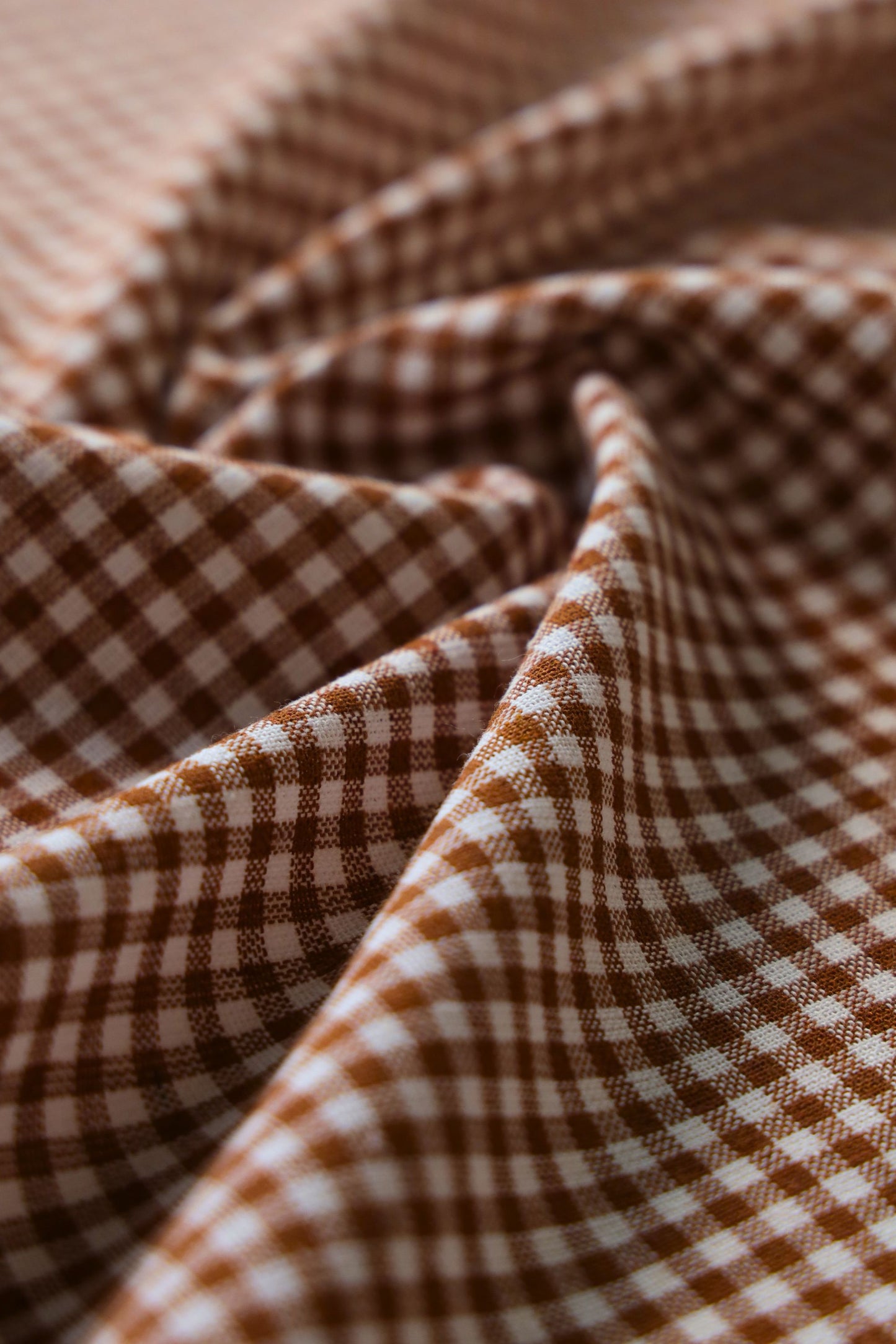 Close-up of brown and white checkered fabric