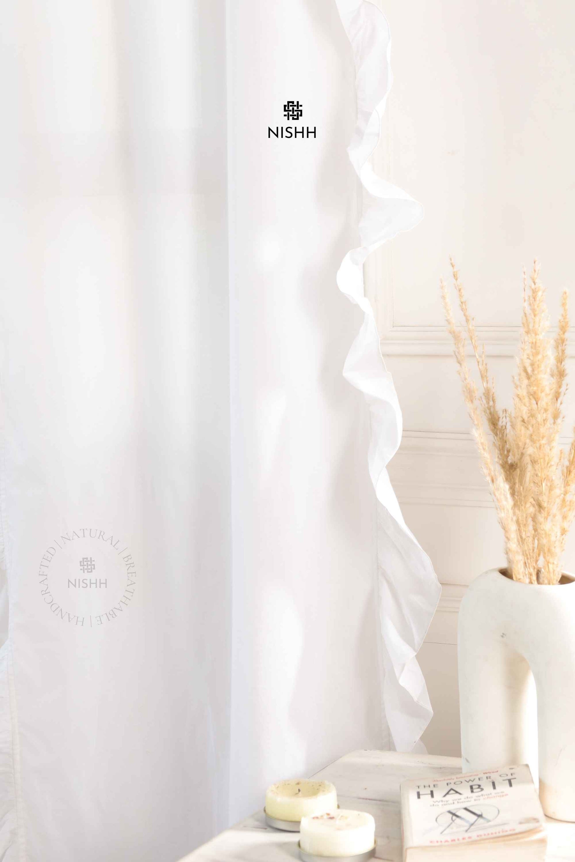 Close up of handcrafted ruffle detailing on Calmcrest linen curtains