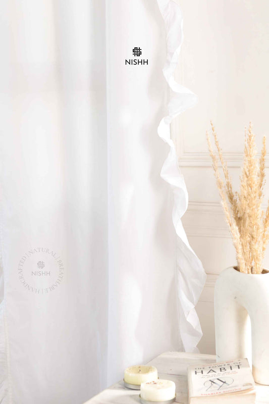 Close up of handcrafted ruffle detailing on Calmcrest linen curtains