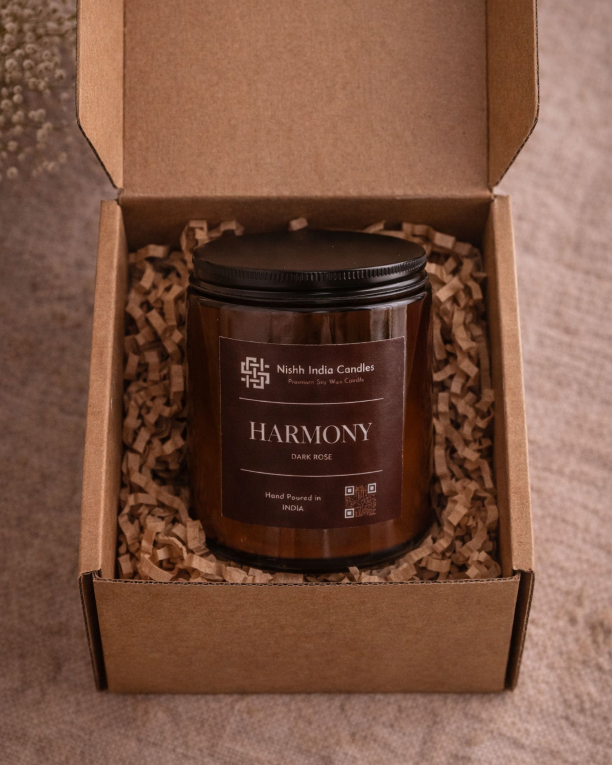 Dark rose scented candle packed in brown corrugated gift box with kraft paper filler, luxury ready-to-gift home fragrance.