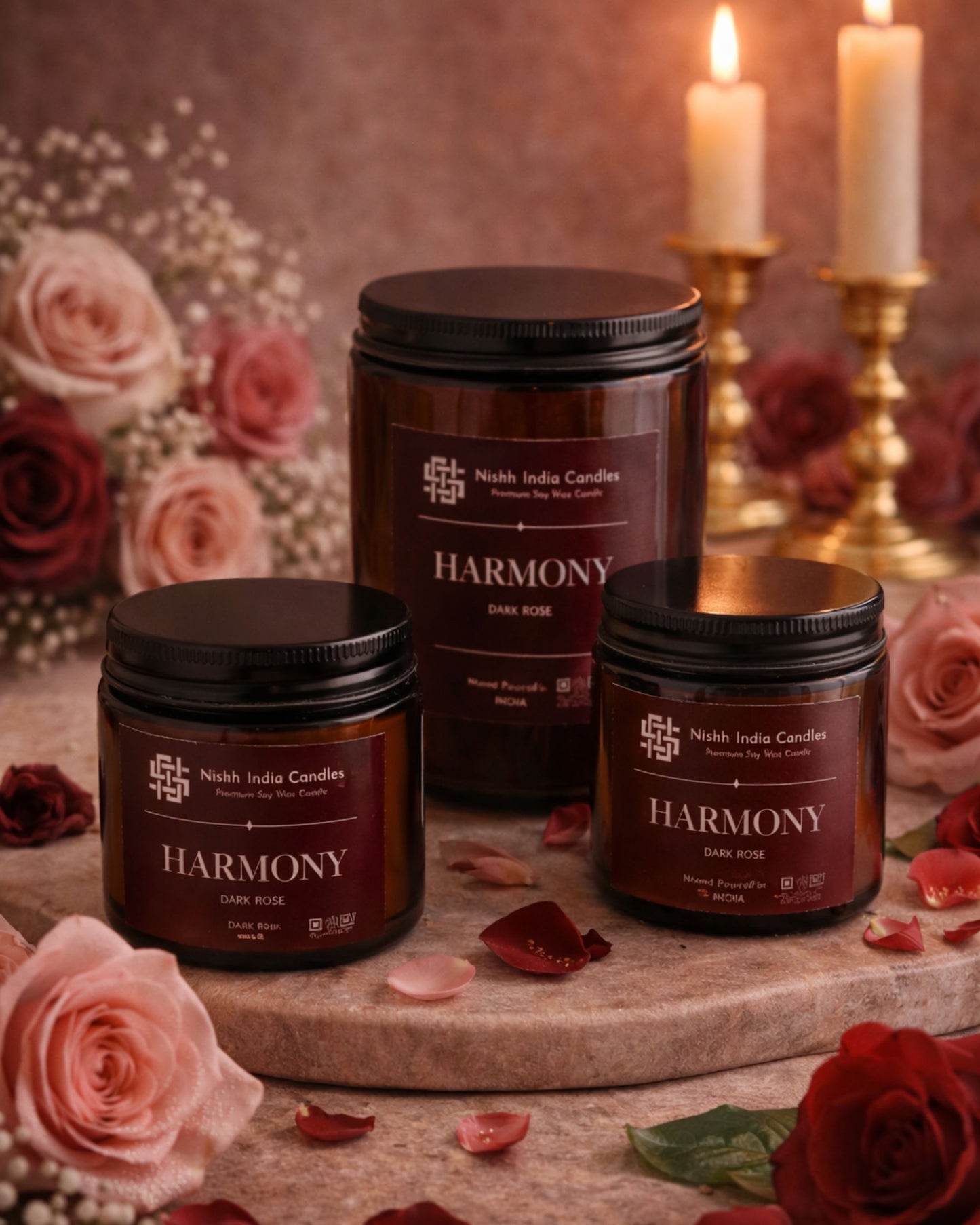 Luxury dark rose candle in amber jar styled on marble surface with soft neutral tones, premium romantic home decor fragrance.