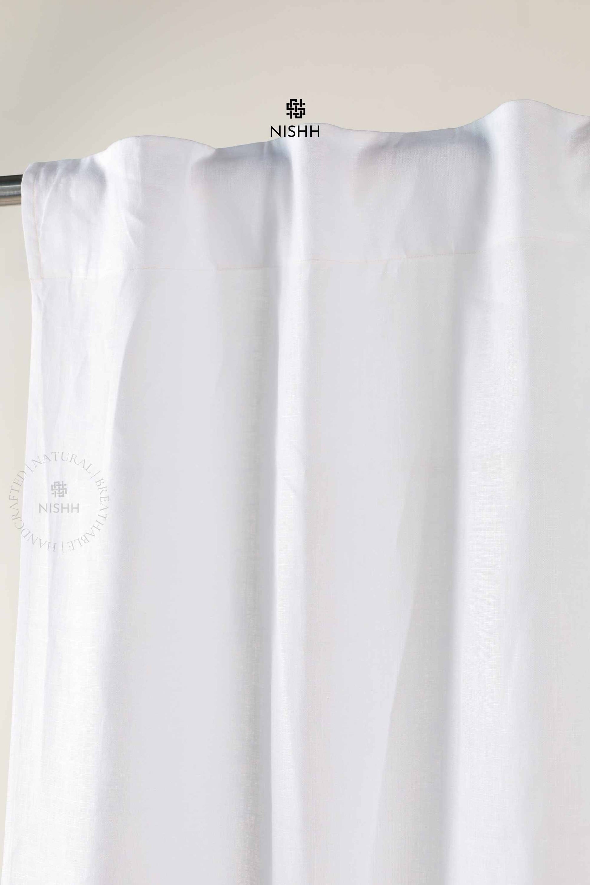 Close up of rod pocket hanging detail on Edith linen curtains