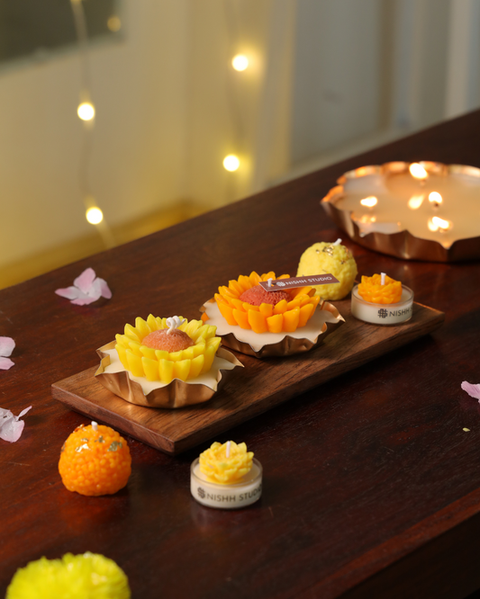 Floral diya candle infused with pumpkin spice fragrance – centerpiece of Arka Gift Set.