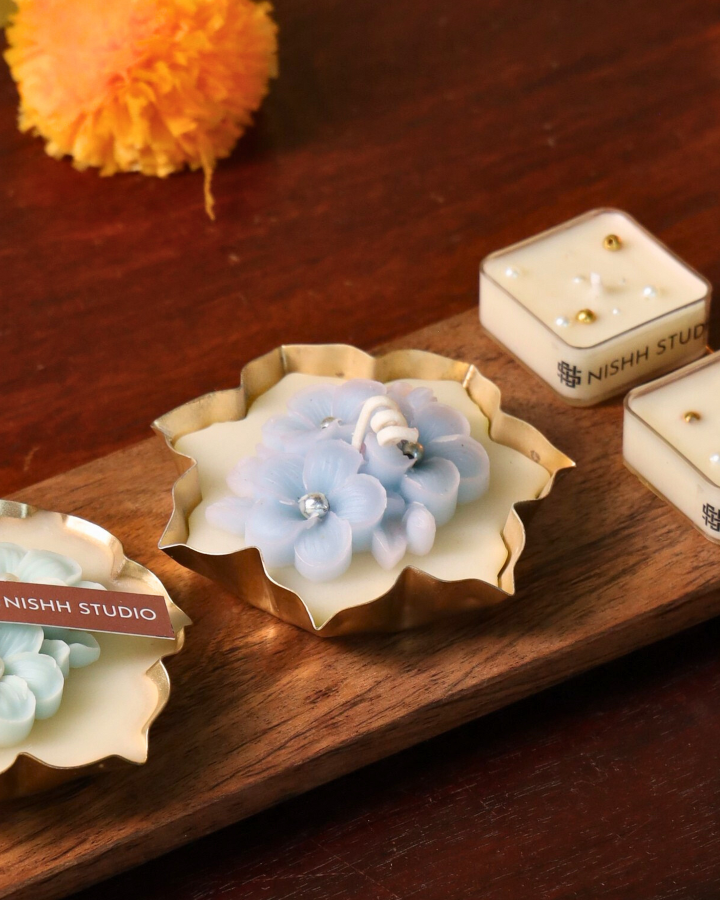 Handcrafted Plumeria floral urli candle – elegant eco-friendly festive décor.