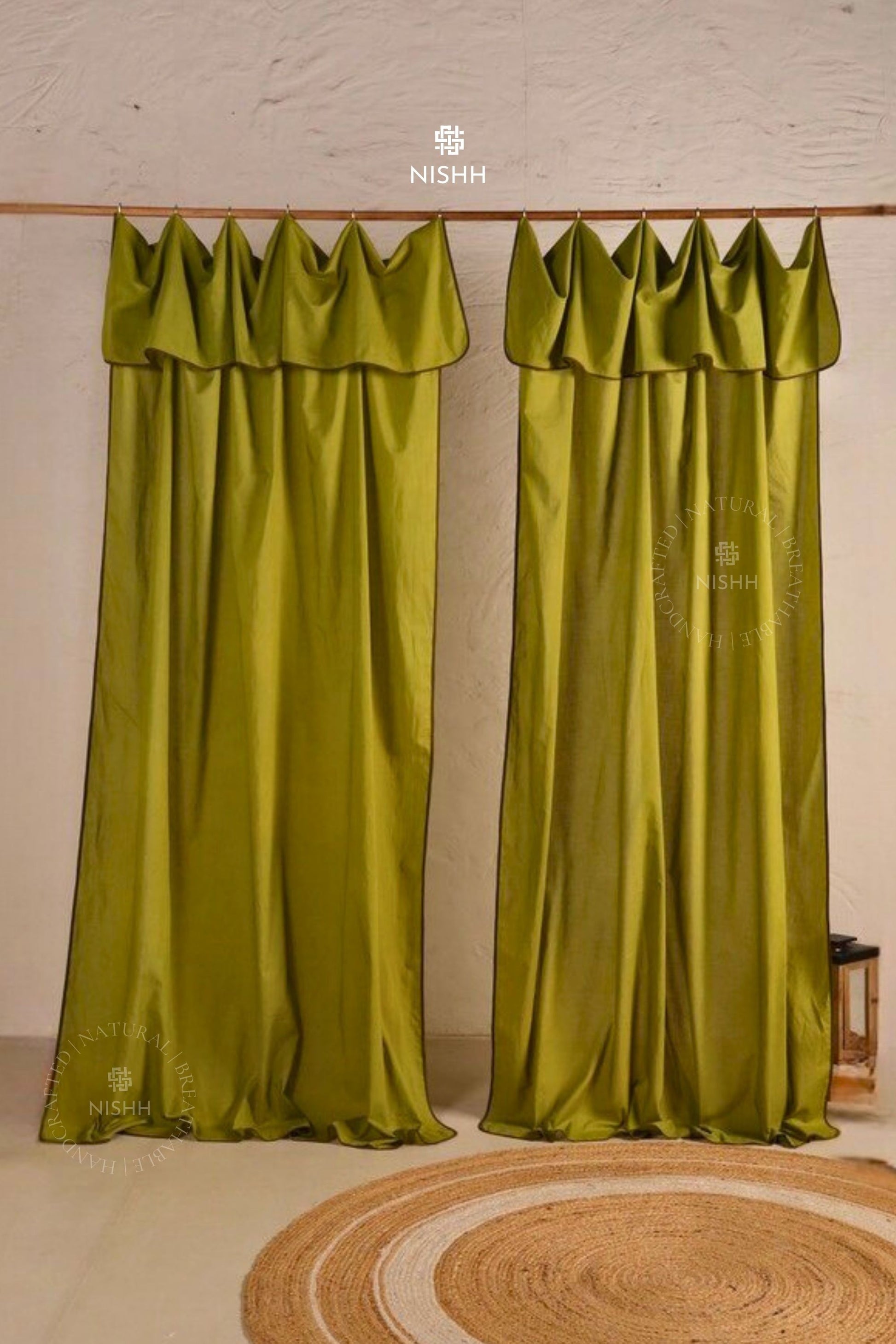 Pair of green poplin curtains with ruffled top