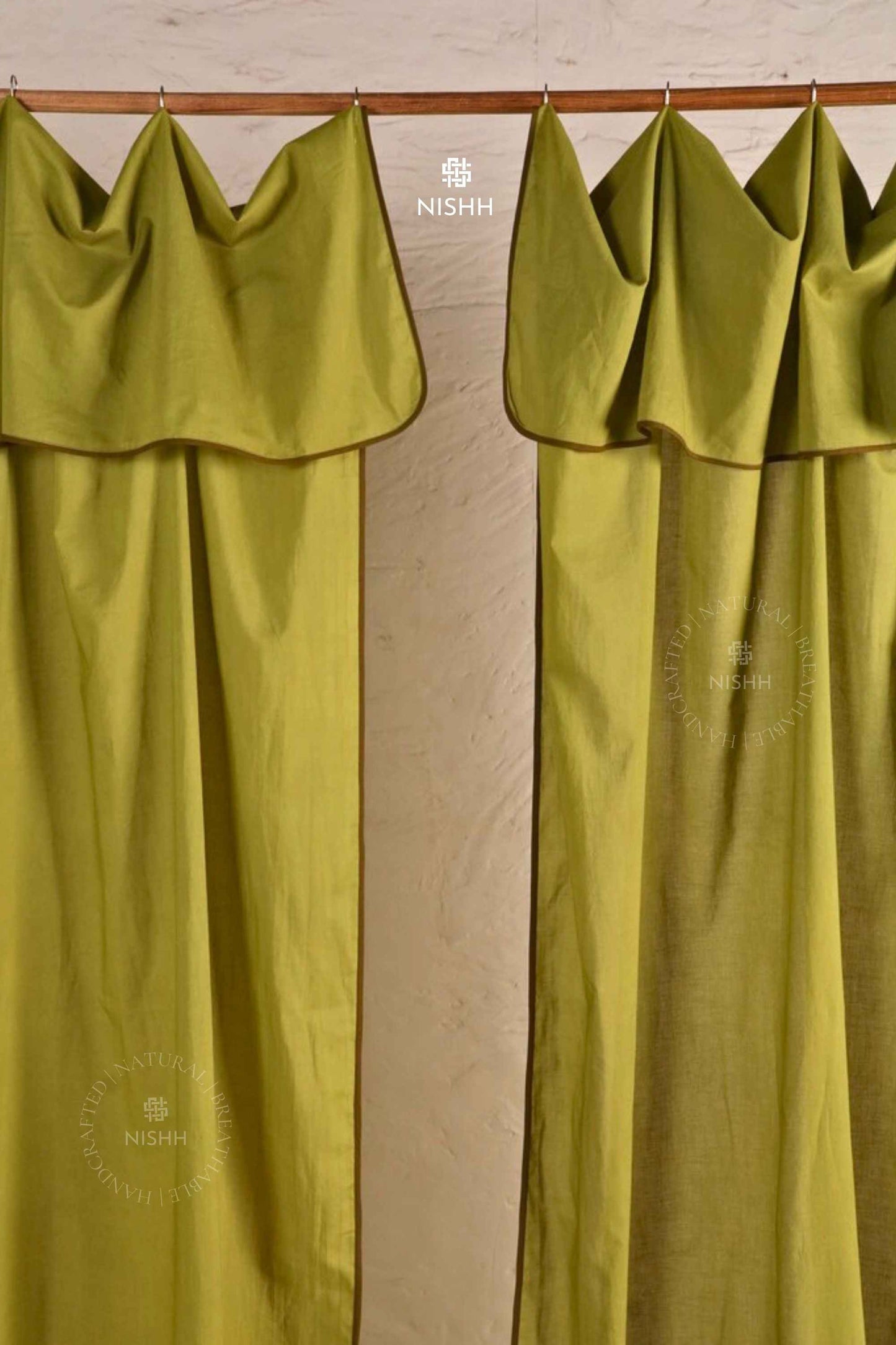 Side view showing graceful fall and movement of Haven linen curtains