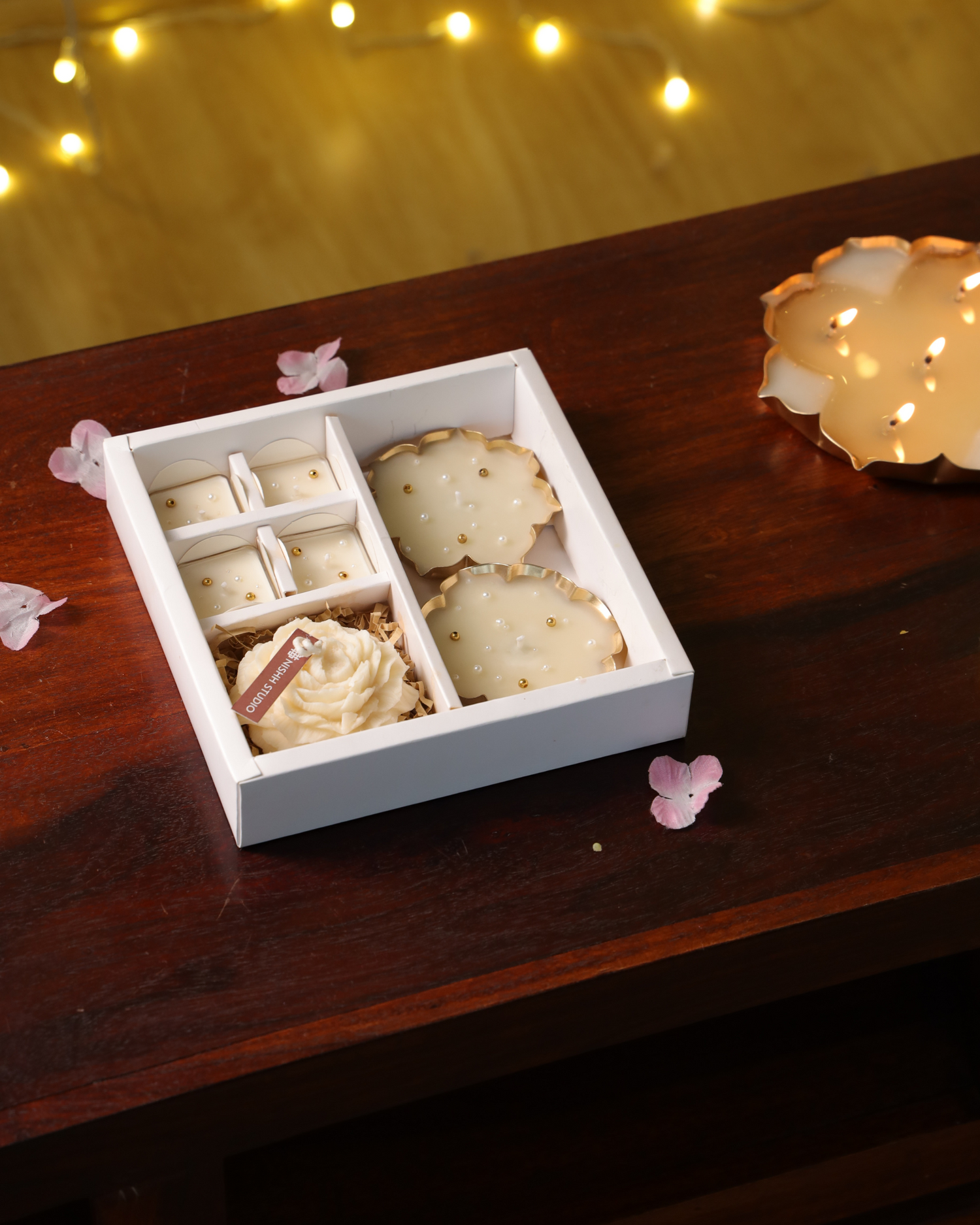 Mukta Diwali Gift Hamper with urli candles, tealights, and peony candle – luxury festive gift set.