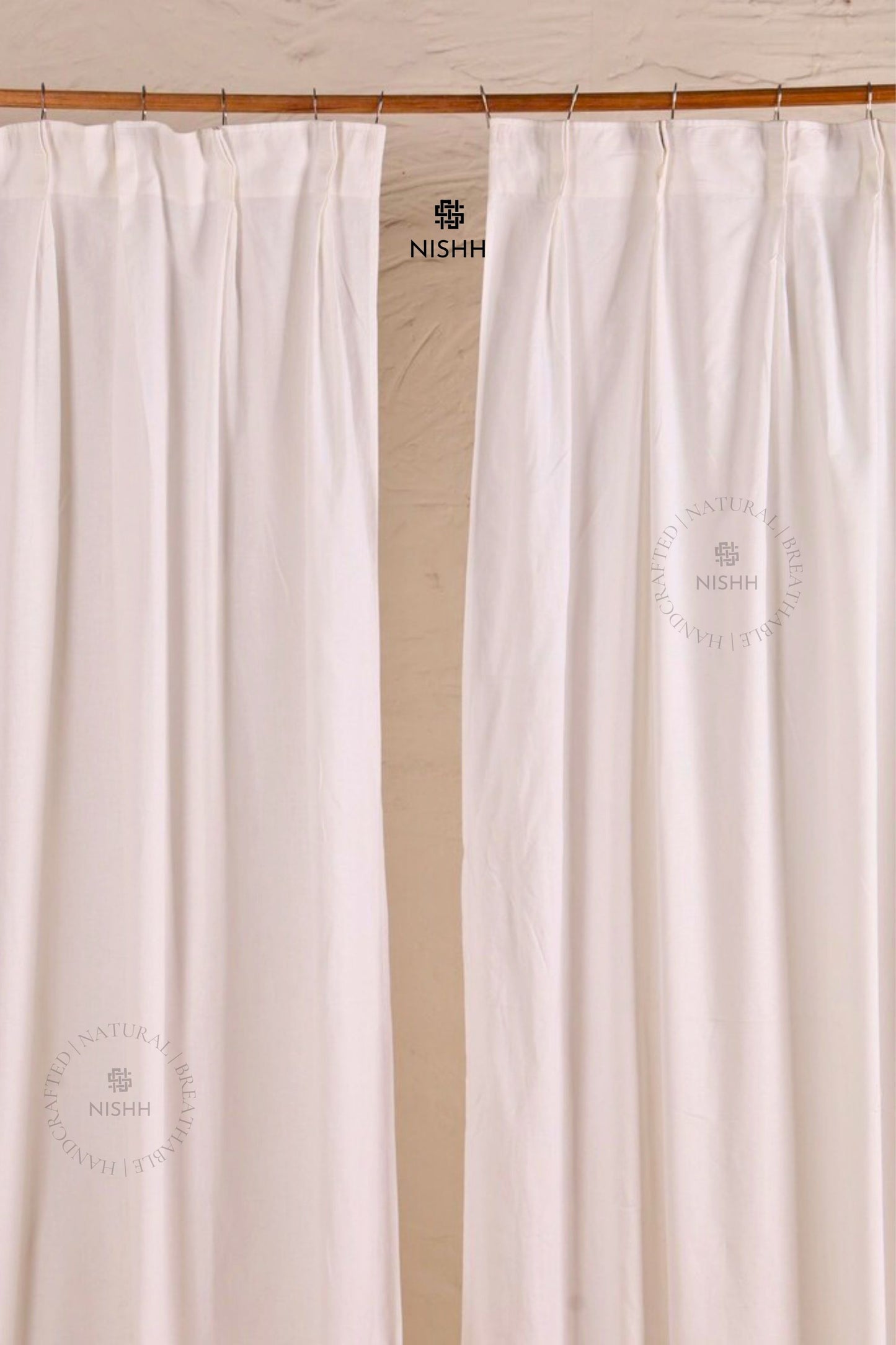 Sheer linen curtains softly filtering natural light in a modern home