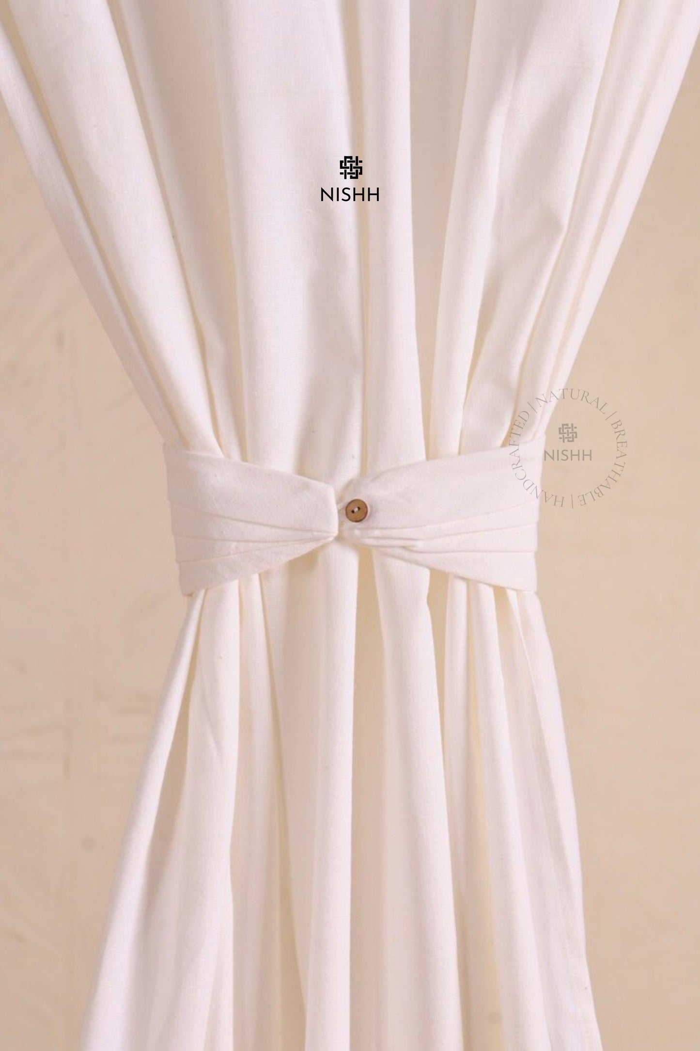 Sustainable sheer linen curtains creating a calm bedroom atmosphere