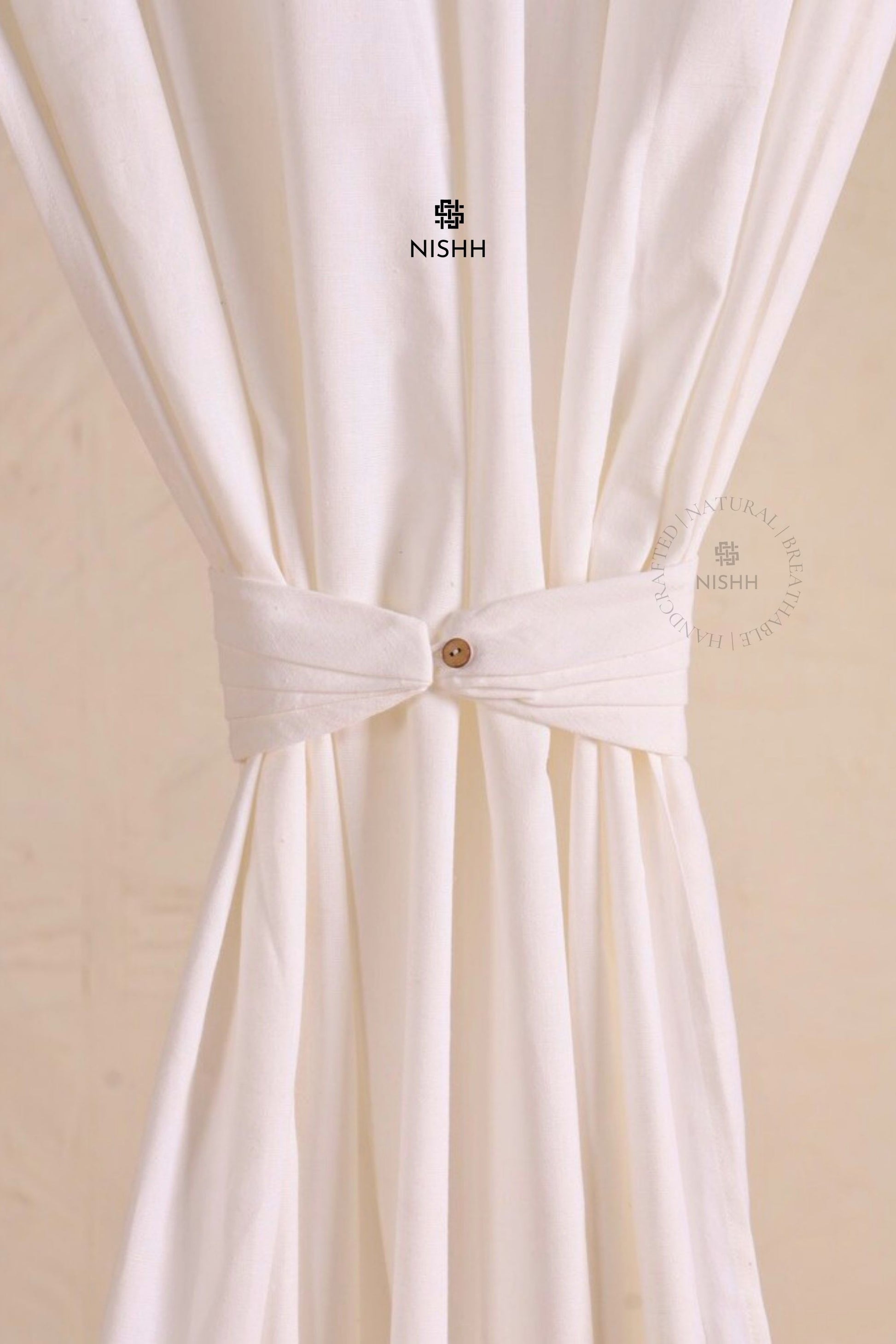 Sustainable sheer linen curtains creating a calm bedroom atmosphere