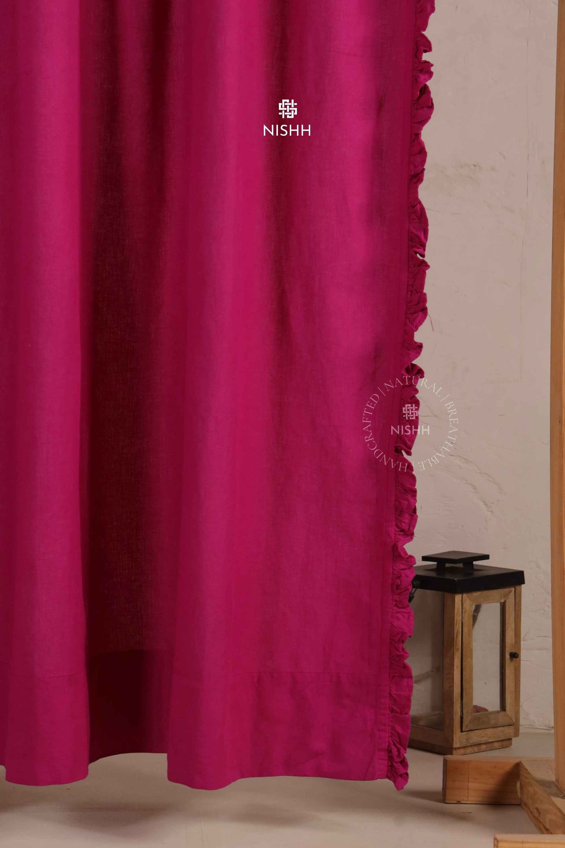 Plume frill linen curtains styled in an elegant living room