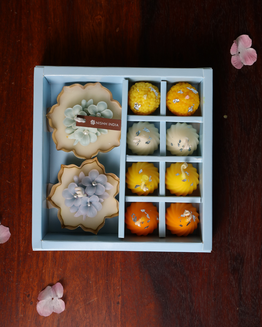Shubh Aarambh Gift Set with urli candles, modak candles, and laddoo candles – luxury festive hamper.