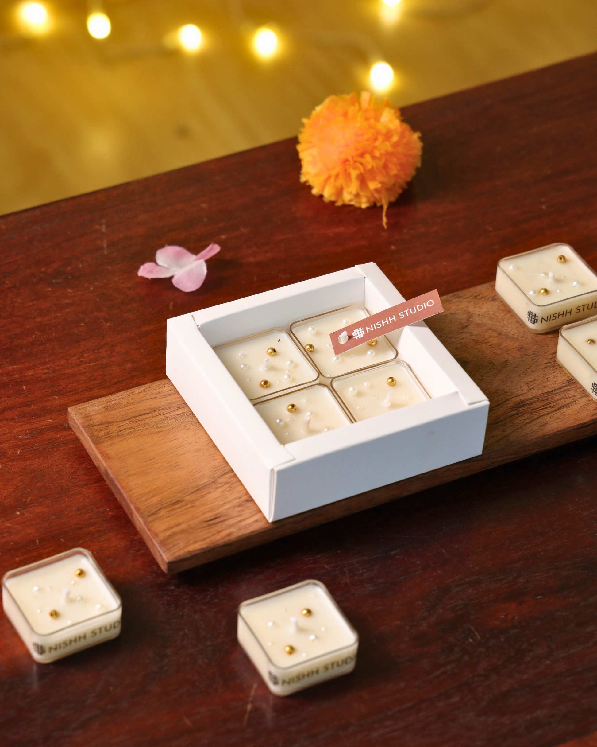 Set of four soy wax tealight candles included in Mukta Luxe festive hamper.