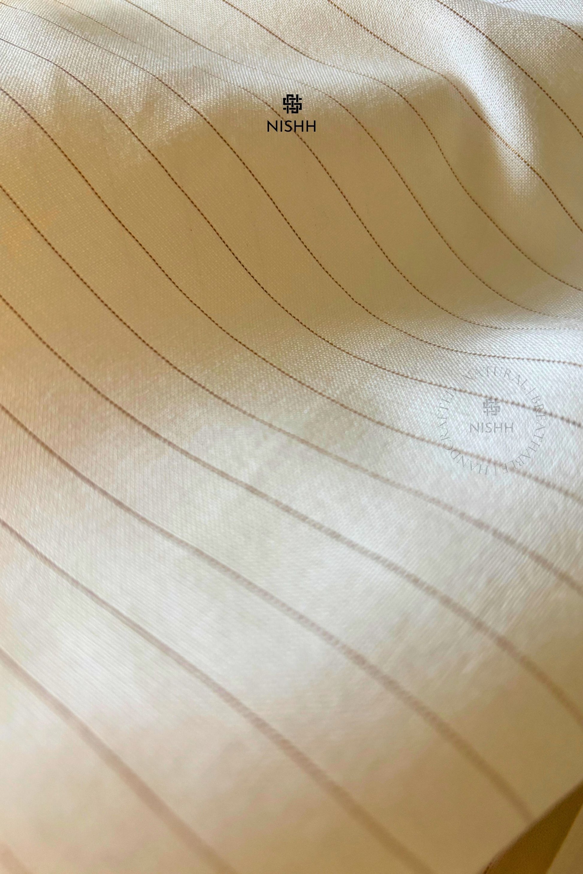 Close up of subtle zari detailing on Whisper cotton curtains