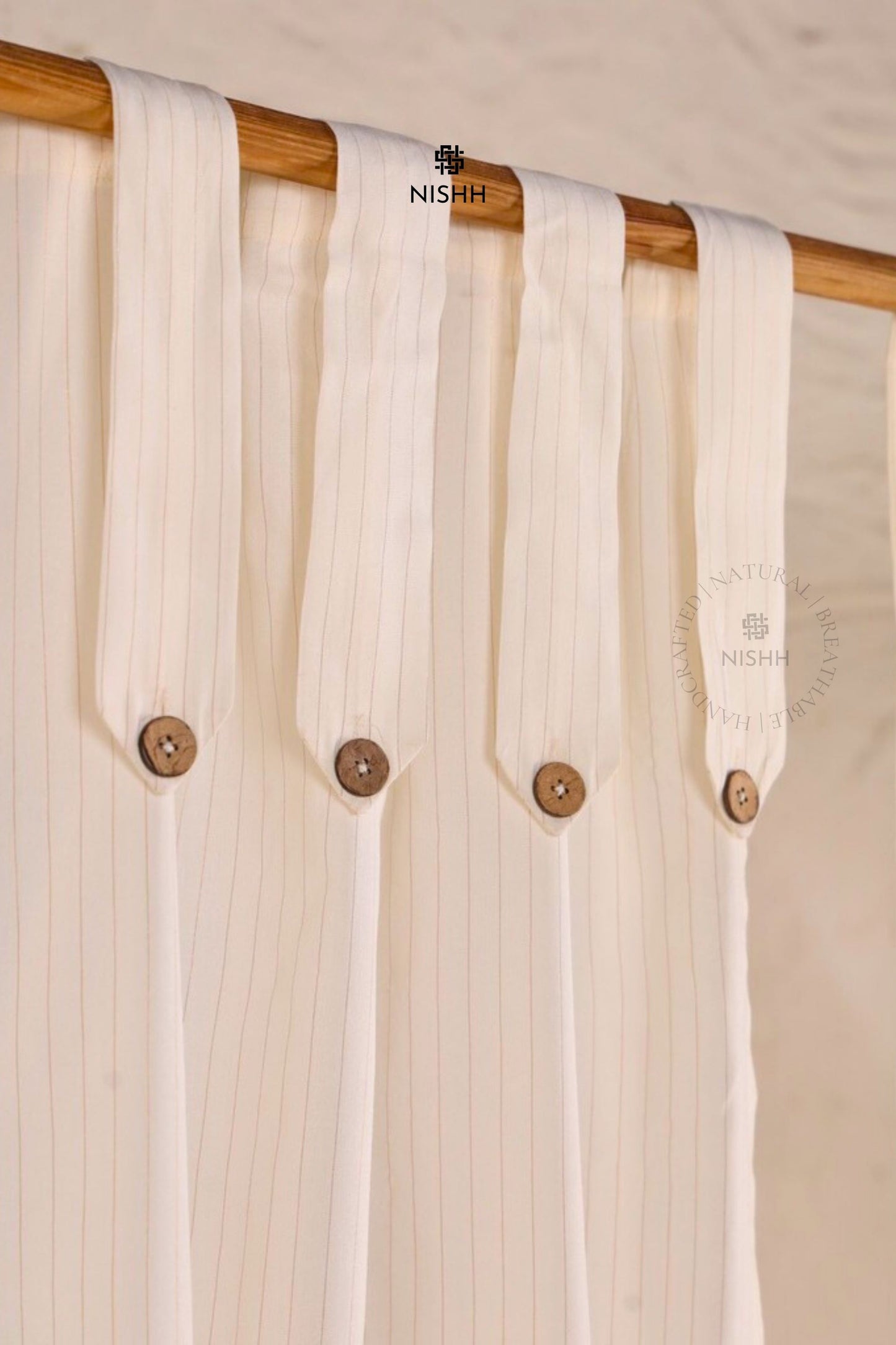 Hanging detail of Whisper cotton zari drapes with soft gathered fall