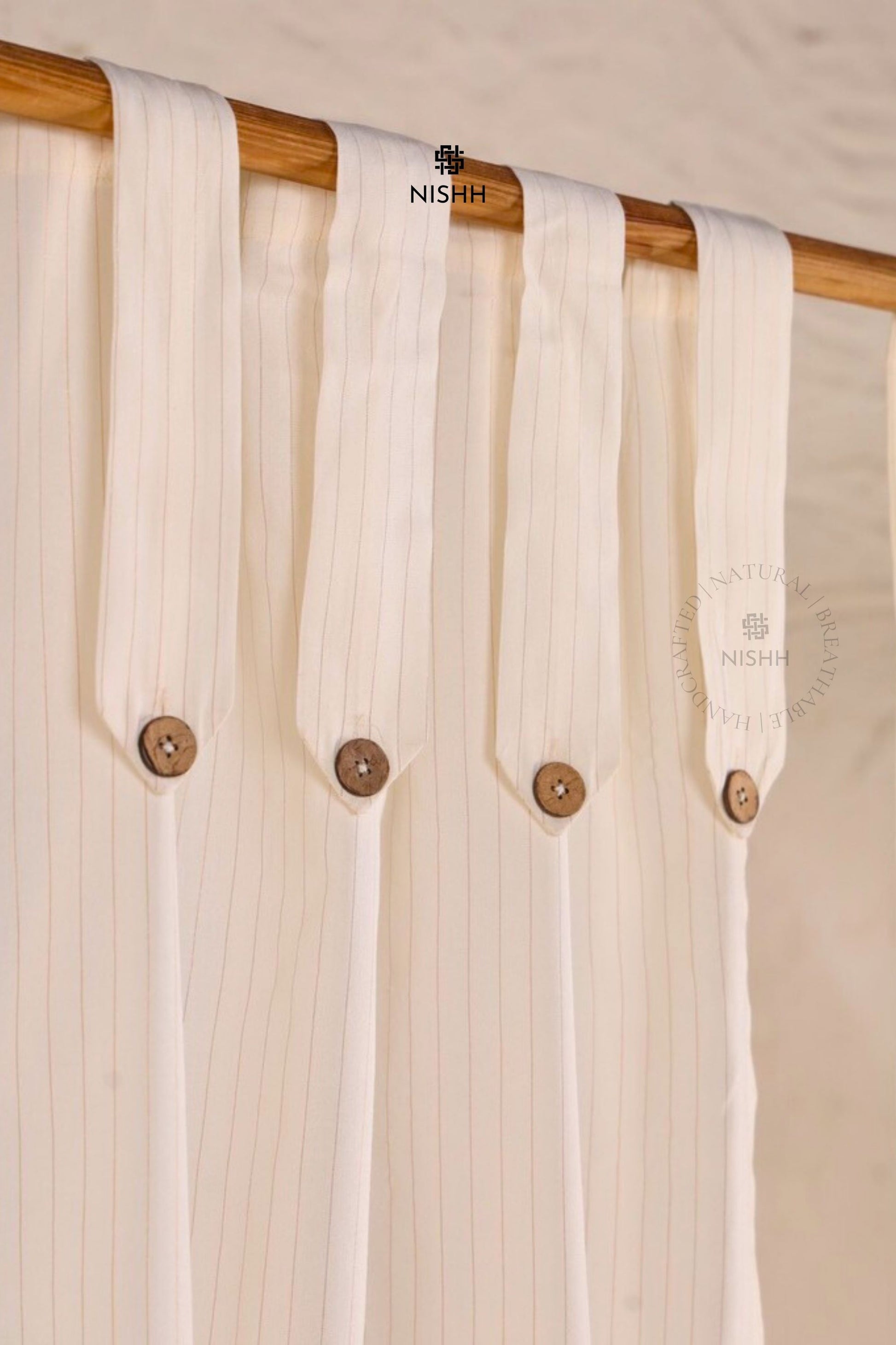 Hanging detail of Whisper cotton zari drapes with soft gathered fall