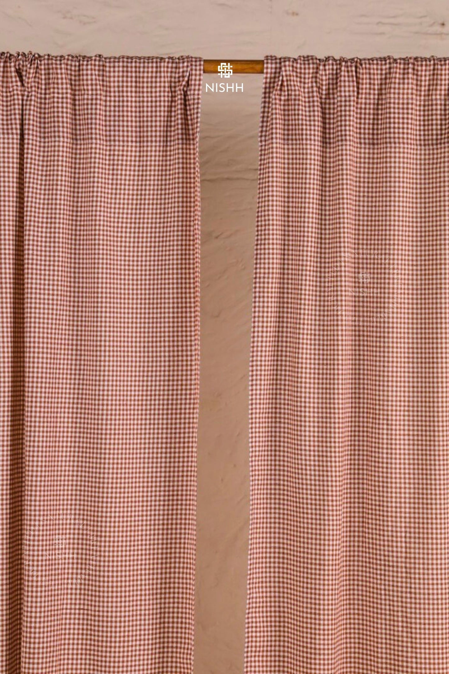 Willow gingham cotton curtains styled in a warm living room